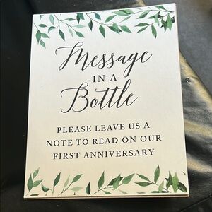 Green and White Message in a Bottle Sign